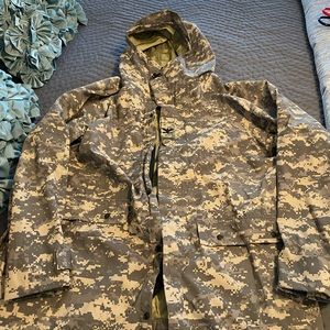 Lightweights, hooded Camo rain coat. Size large.